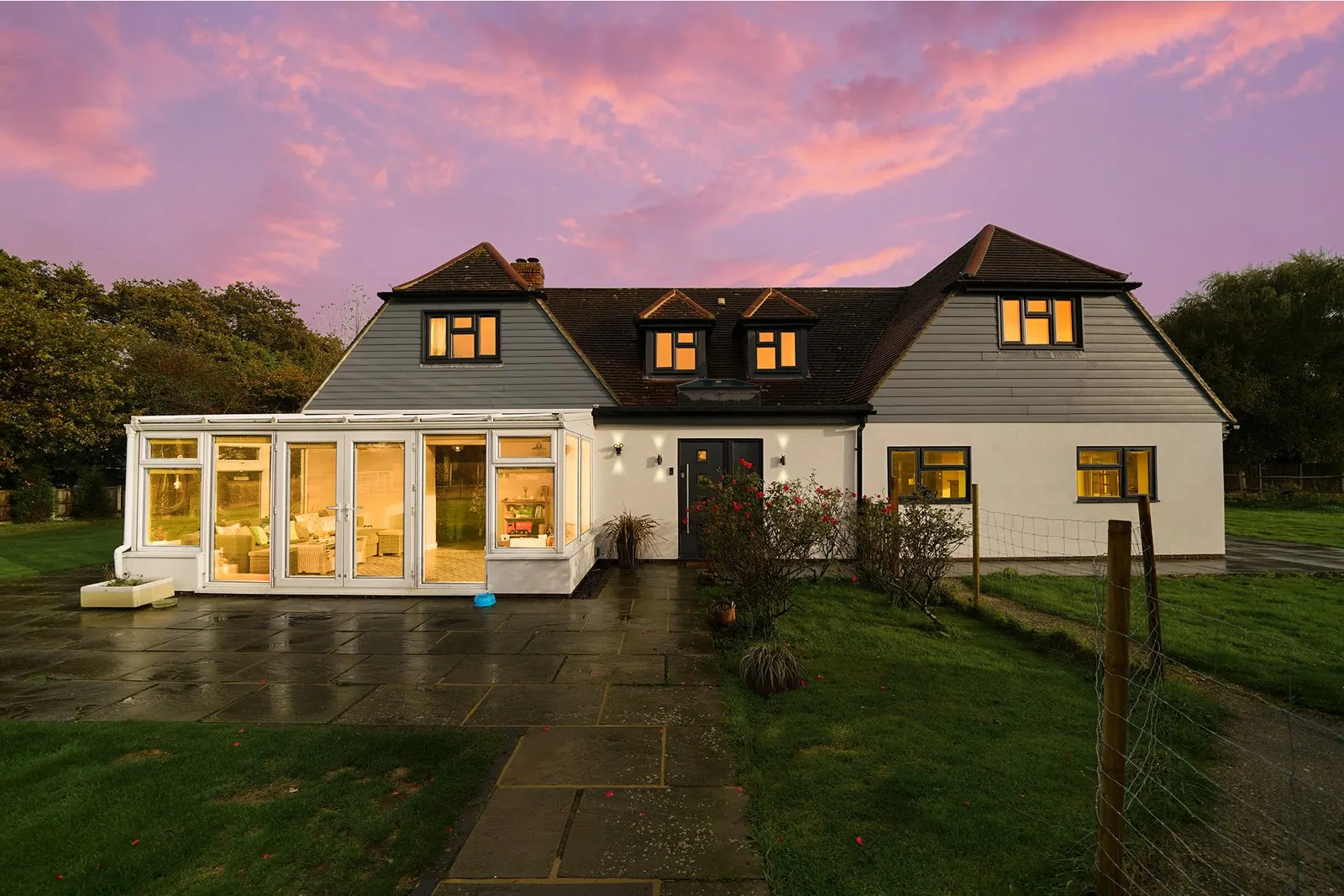 Day-to-dusk twilight conversion of a family home by Pixxium Studio